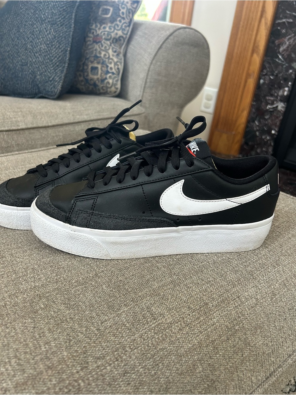 Nike Women’s Black Sneakers with White Swoosh